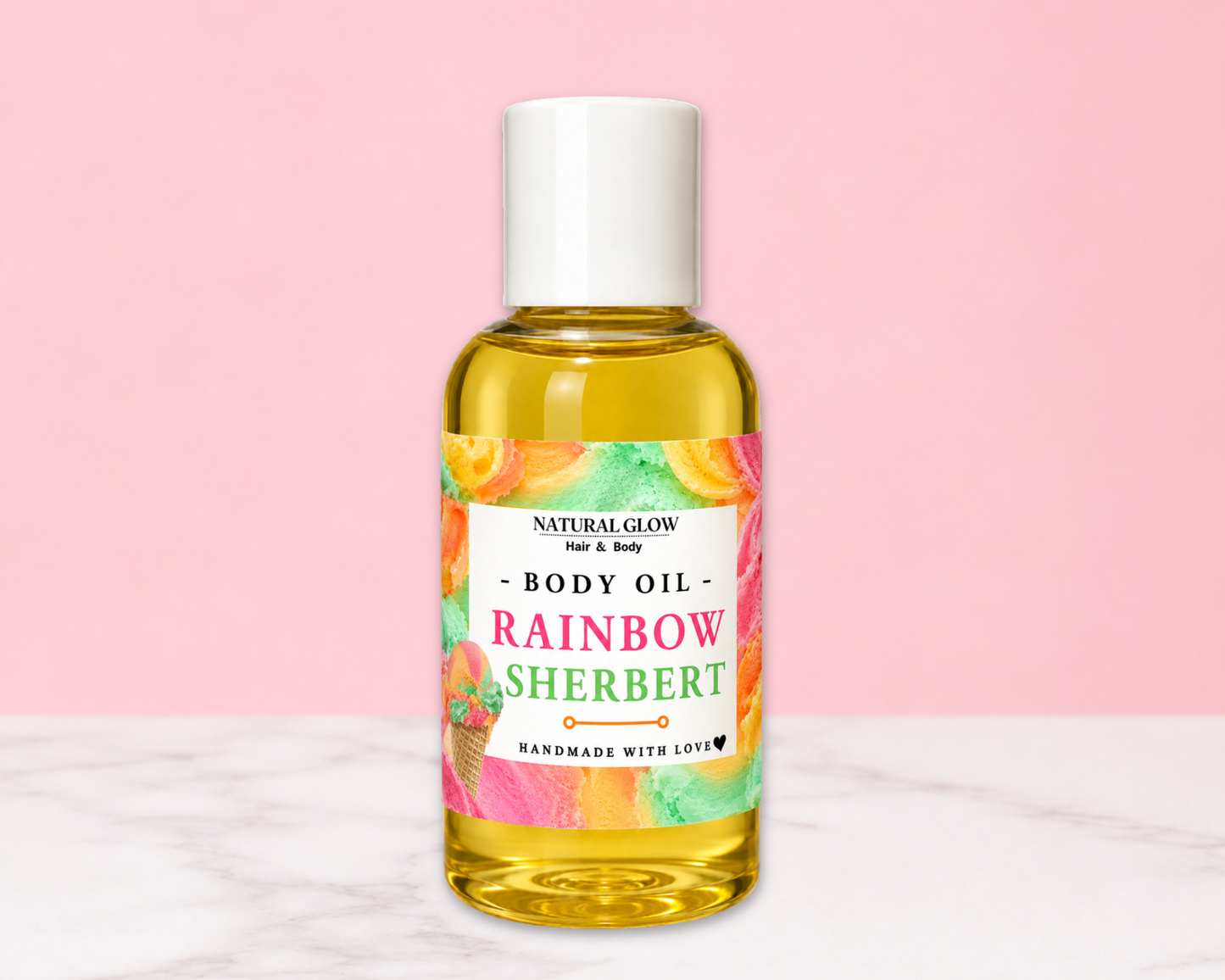 A bottle of Natural Glow Rainbow Sherbert body oil with a white cap and a colorful tropical label, set against a pink background with a white marble surface.