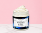 Natural Glow Night Fall mens whipped body butter in a jar with cream-colored butter swirl, pink background, and white marble surface