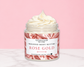 Natural Glow Rose Gold whipped body butter in a jar with cream-colored butter swirl, pink background, and white marble surface