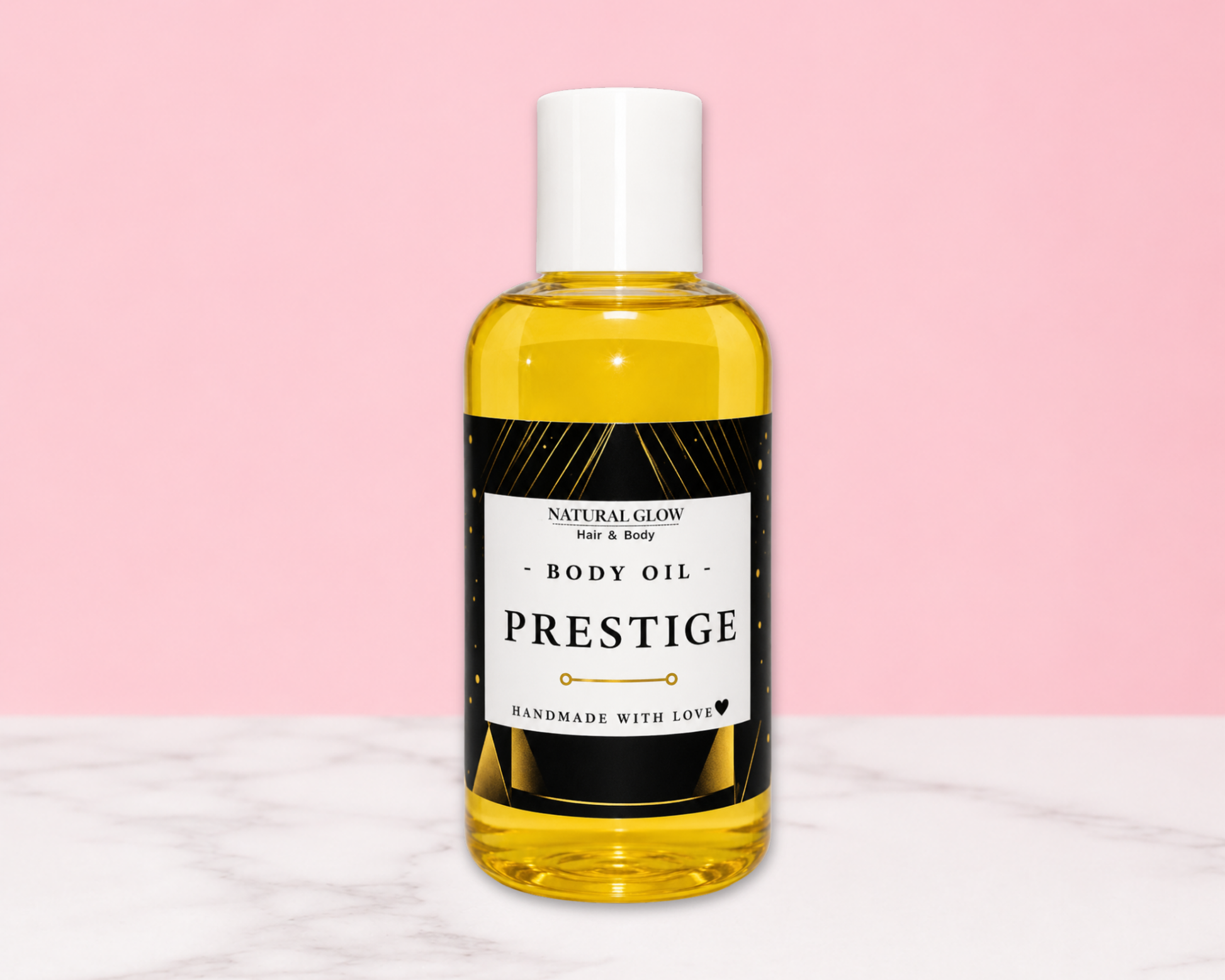 A bottle of Prestige Body Oil by Natural Glow, filled with golden yellow oil, featuring a black and white label, set against a pink background with a white marble surface.